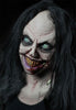 Scary girl animatronic with creepy smile and bloody mouth