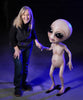Cute alien prop holds the hand of Marsha Taub Edmunds of Distortions Unlimited