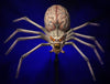 Halloween spider prop hangs in a spooky scene