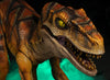 Velociraptor dinosaur animatronic with sharp teeth