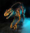 Orange dinosaur animatronic called Raptor by Distortions Unlimited