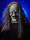 Scary Wicked Witch prop with creepy smile and green skin