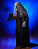 Witch prop for Halloween decorating in blue fog