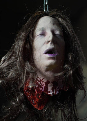 Accesorio de cabeza cercenada de Spirit Halloween