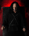 The Villain extreme Halloween animatronic prop with red fog in the background