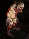Bloody Beast savagely scary monster animatronic prop with giant teeth and bloody claws