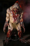 Bloody Beast savage animatronic prop. Monster with big teeth in chains