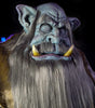 Colossus animatronic with eyes closed and big teeth and ears