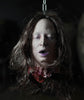 Heather severed head prop hangs by a chain. Quality cut off head prop made of latex and foam.