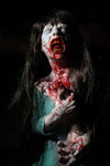 Zombie girl flesh eating zombie prop