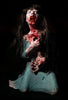 Dead Debby disturbingly creepy flesh eating zombie girl prop with a severed hand