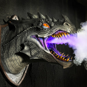 Black Dragon Legends wall hanging prop blows smoke with LED lights. This mounted dragon head shows its sharp teeth. 
