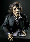 Zombie prop rises from the grave in your Halloween cemetery scene