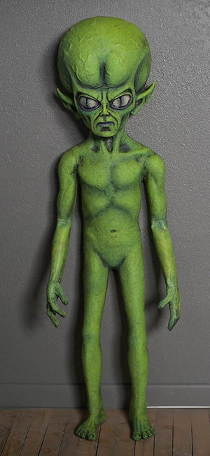 Green Martian alien prop made of latex and foam