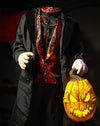 Headless Horseman Halloween prop with glowing jack o lantern in hand