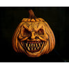 Creepy pumpkin Halloween prop sinister smile and face with big sharp teeth.