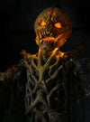 Pumpkin Stalker scary Halloween prop photo of face from below.