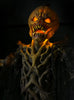 Pumpkin Stalker scary Halloween prop photo of face from below.